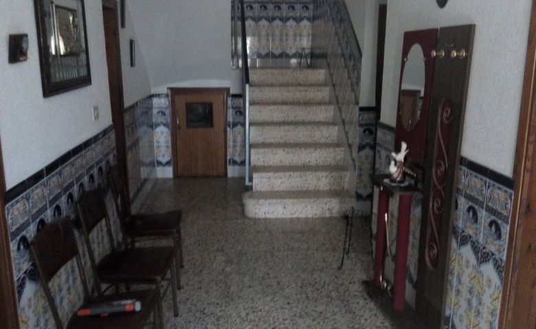 Charming village property in Zujar, Granada, featuring traditional decor and cozy interiors.