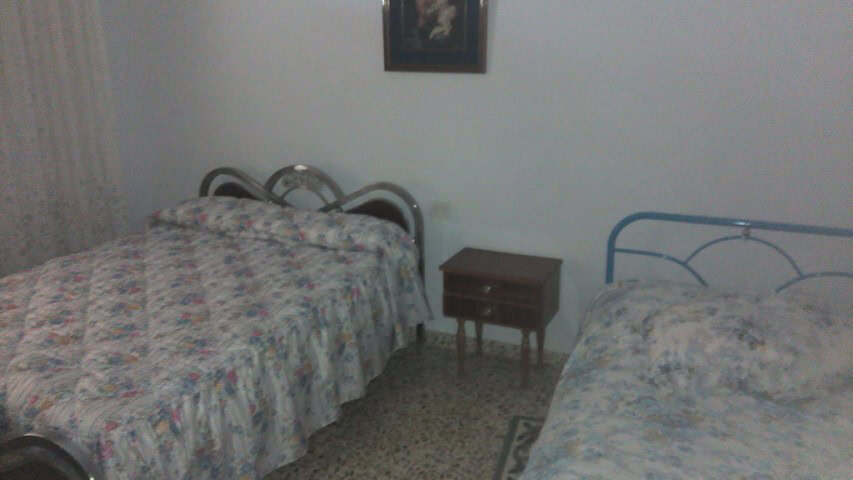 Charming village property in Zujar, Granada, featuring two bedrooms and simple furnishings. Ideal fo.