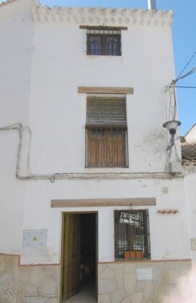 Traditional village house in Hinojares, Jaen with rustic charm and potential.