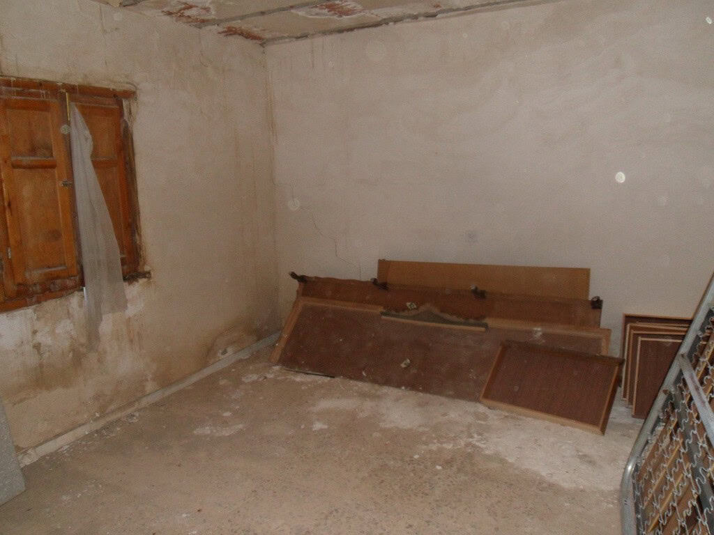 Village property interior with rustic features in Freila, Granada, ideal for renovation.
