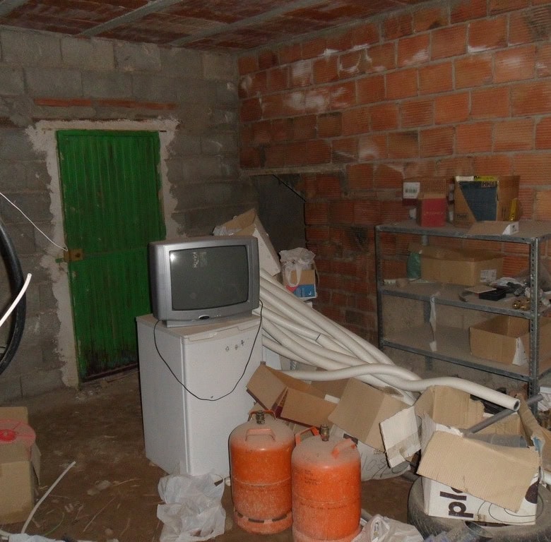 Charming village property in Freila, Granada, with rustic interior, storage area, and traditional br.