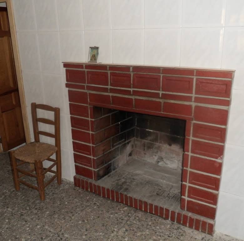 Cave house fireplace in Freila, Granada, Spain. Unique property with rustic charm and traditional fe.