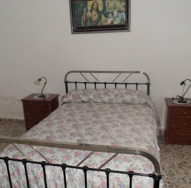 Unique cave house for sale in Freila, Granada, offering rustic charm and scenic mountain views.