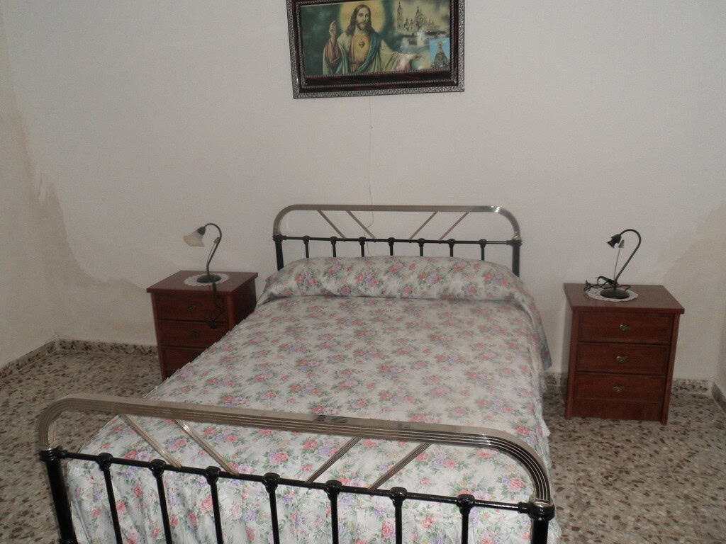 Unique cave house for sale in Freila, Granada, offering rustic charm and scenic mountain views.