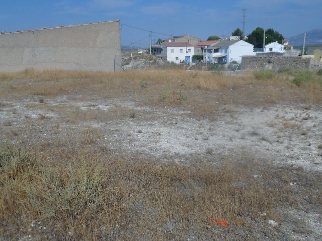 Cave house plot in Cuevas del Campo, Granada, ideal for renovation or new construction.