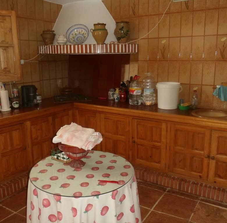 Commercial property in Loja, Granada with wooden kitchen and rustic decor.