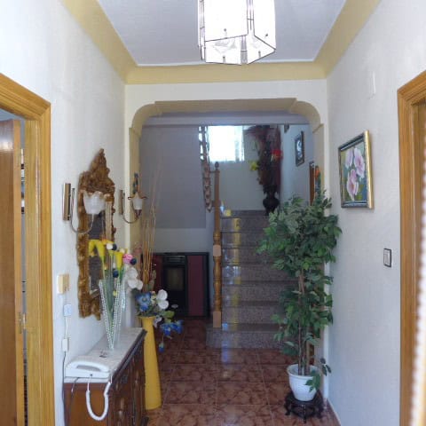 Town House interior in Fontanar, Jaen with traditional decor and cozy atmosphere.
