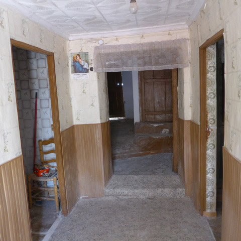 Charming rural home interior in Don Pedro, Jaen, featuring rustic decor and simple furnishings.