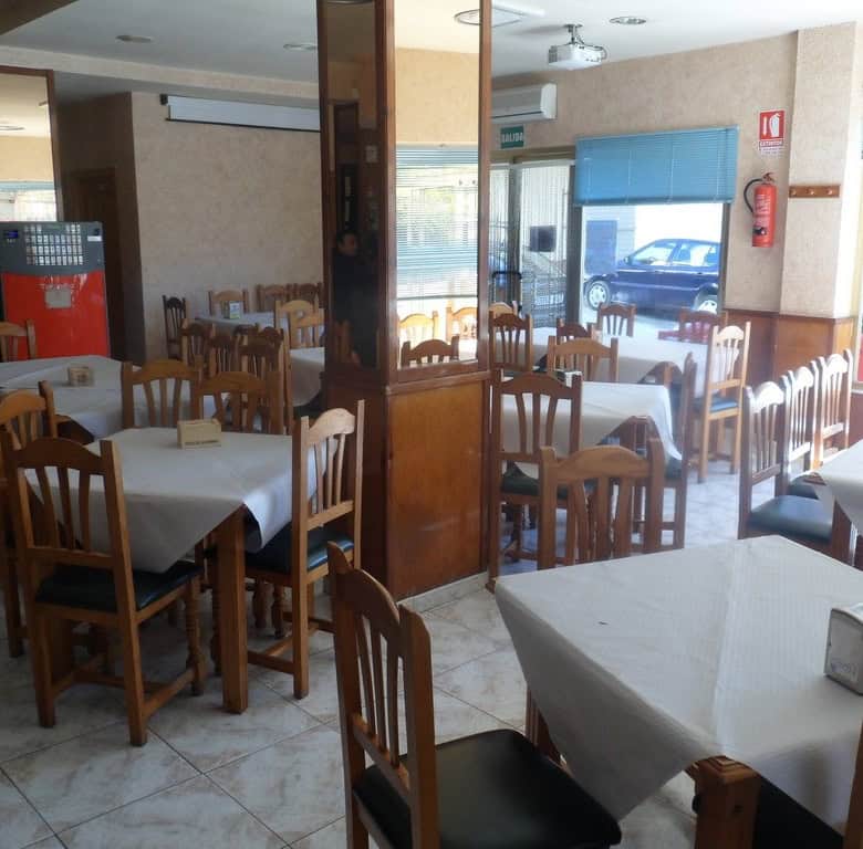 Cozy restaurant dining area in Cuevas del Campo, Granada.