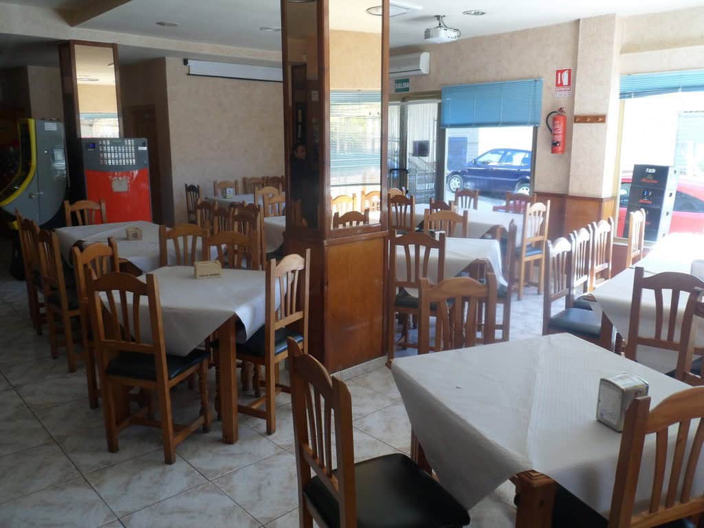Cozy restaurant dining area in Cuevas del Campo, Granada.