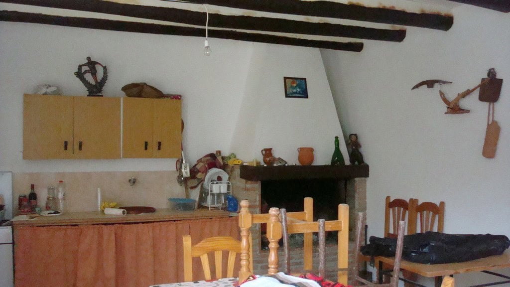 Charming rural property in Hijate, Almeria, featuring traditional decor and rustic wooden beams.