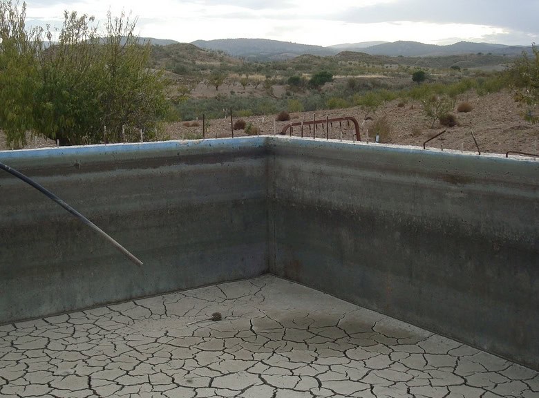 View of the rooftop terrace of a rural property in Hijate, Almeria, with scenic landscape background.