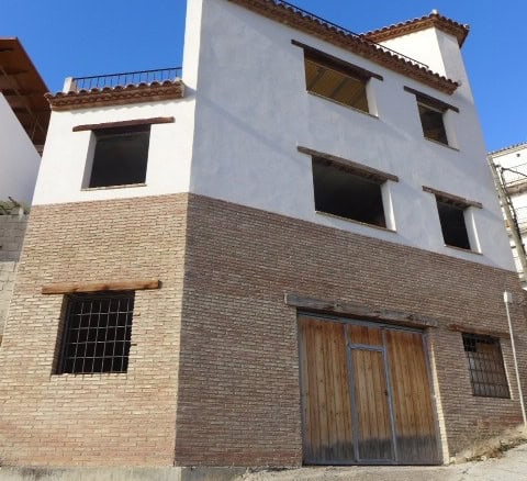 Charming town house in Castril, Granada, with traditional architecture and modern updates, ideal for.