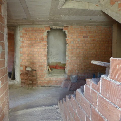 Town House under construction in Castril, Granada, with brick walls and unfinished interior.
