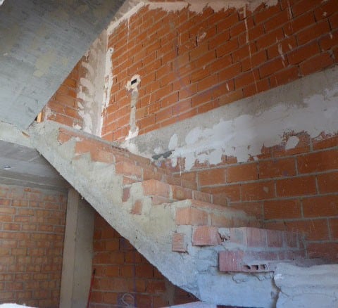 Interior staircase under construction in a town house in Castril, Granada.