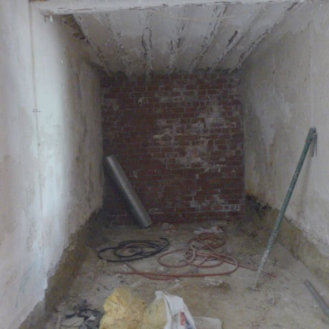 Interior view of a rustic town house under renovation in Castril, Granada.