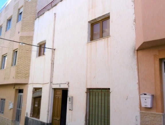 Town House in Tijola, Almeria with traditional architecture and rustic appeal.