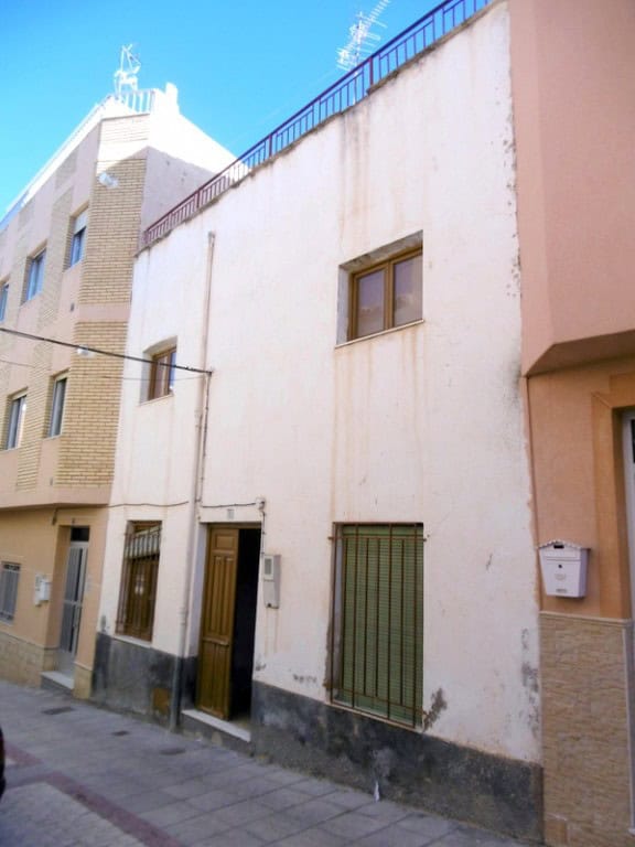 Town House in Tijola, Almeria with traditional architecture and rustic appeal.