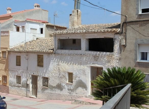 Charming town house in Tijola, Almeria, with rustic exterior and traditional architecture.