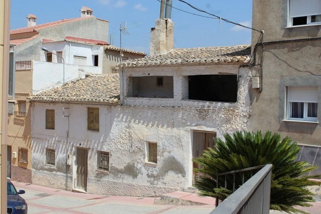 Charming town house in Tijola, Almeria, with rustic exterior and traditional architecture.