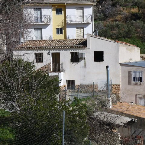 Charming rural property in Don Pedro, Jaen, featuring traditional architecture and scenic mountain v.