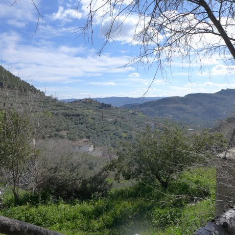 Rural property with scenic mountain views in Don Pedro, Jaen, ideal for countryside living or invest.