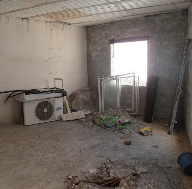 Interior of a rustic cave house in Freila, Granada under renovation.