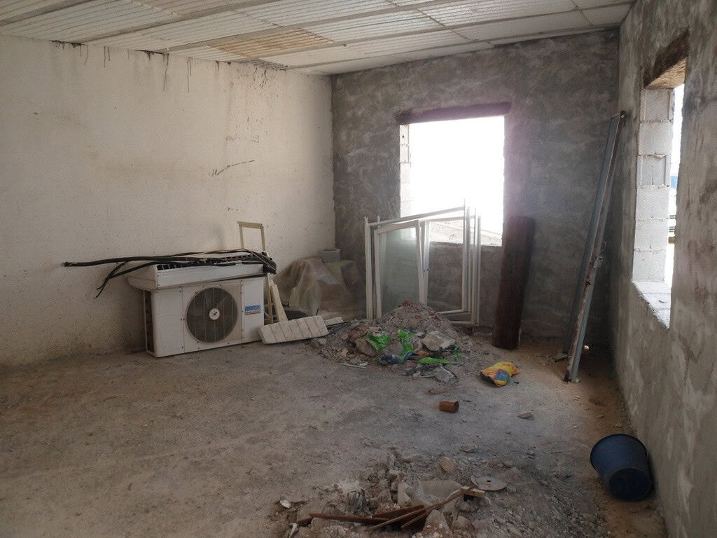 Interior of a rustic cave house in Freila, Granada under renovation.