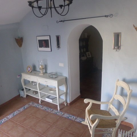 Cave house interior in Galera, Granada, showcasing traditional decor and cozy living space.