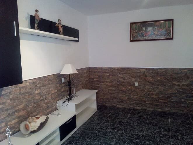 Cozy interior of a village property in Tijola, Almeria, featuring a modern living space with decorat.