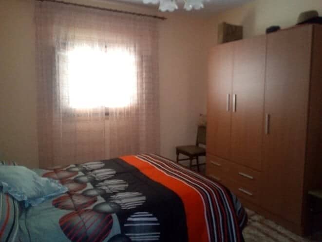 Village Property Interior with Bedroom and Wardrobe.