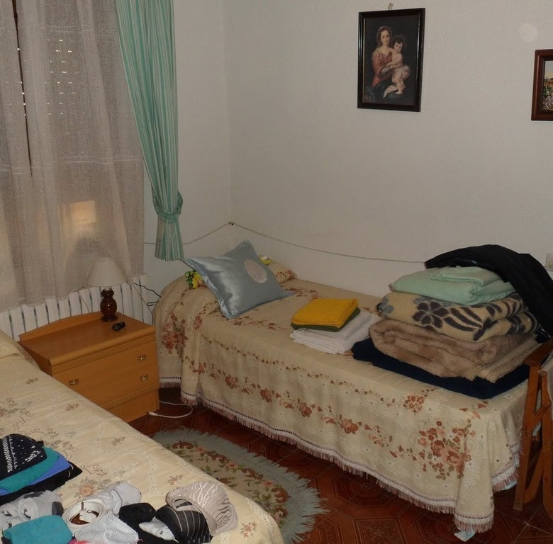 Charming village property in Zujar, Granada, featuring cozy bedrooms and traditional decor. Ideal fo.