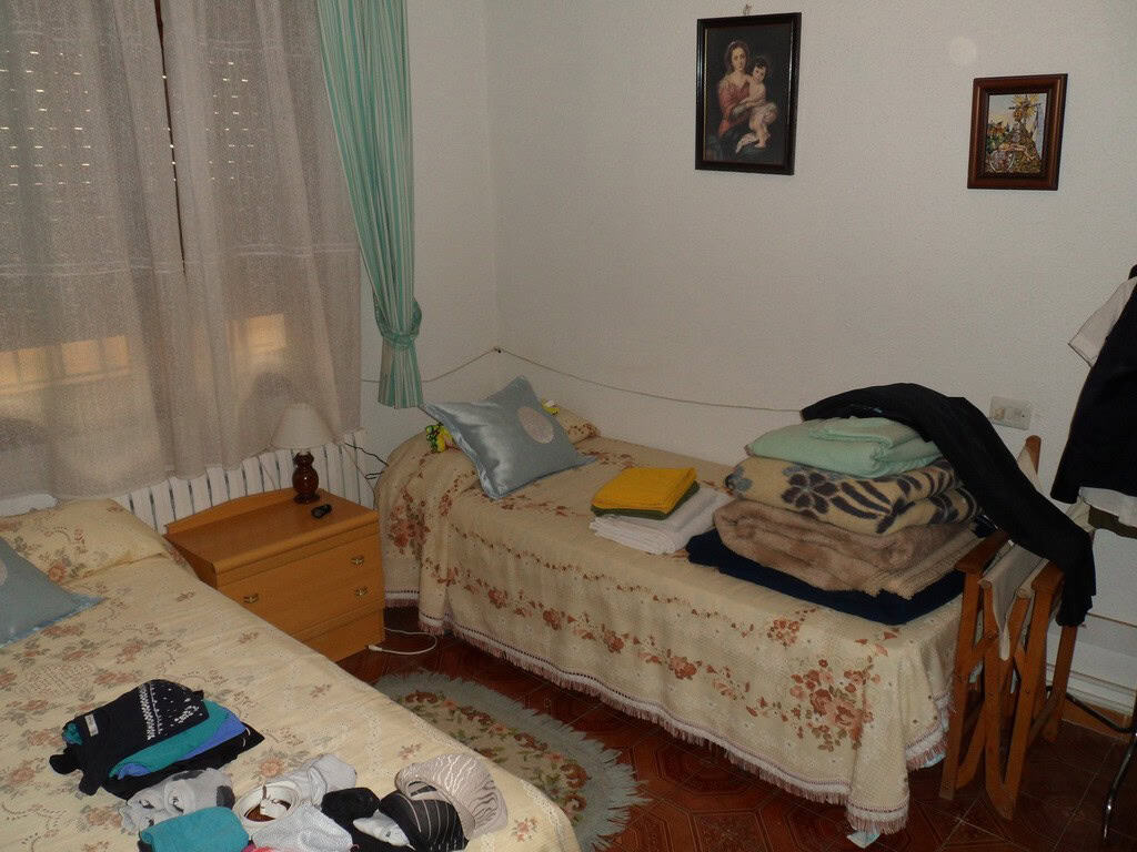 Charming village property in Zujar, Granada, featuring cozy bedrooms and traditional decor. Ideal fo.