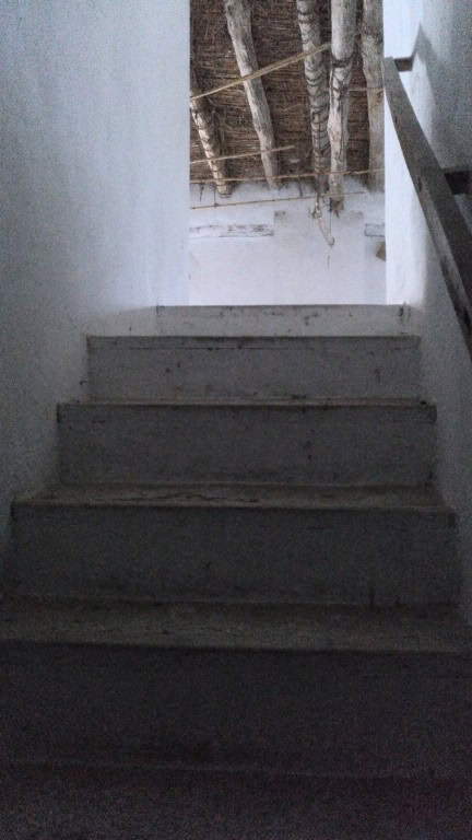 Interior view of rustic stairs in a rural property in La Alqueria, Granada.