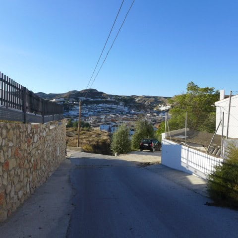 Cave house in Galera, Granada, with scenic mountain views and rustic surroundings.