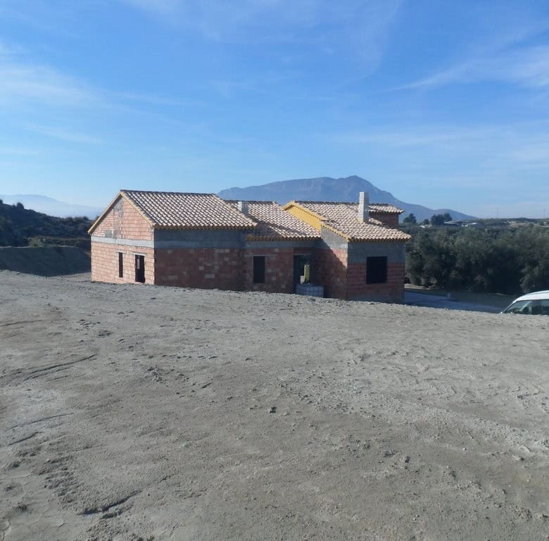Farm property for sale in Benamaurel, Granada, with scenic mountain views and rural surroundings.