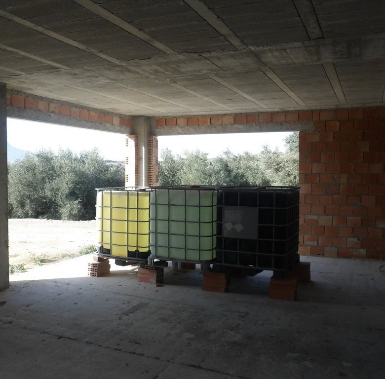 Farm property with water tanks in Benamaurel, Granada, under construction.