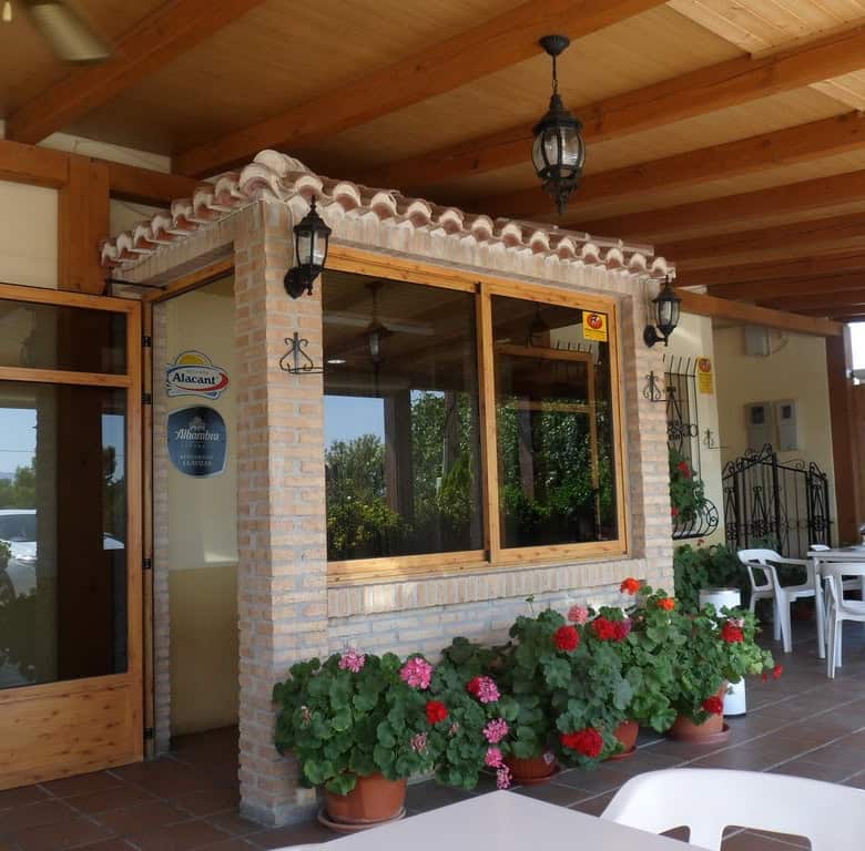 Commercial property in Baza, Granada with outdoor seating and charming architecture.