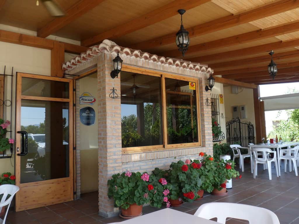 Commercial property in Baza, Granada with outdoor seating and charming architecture.
