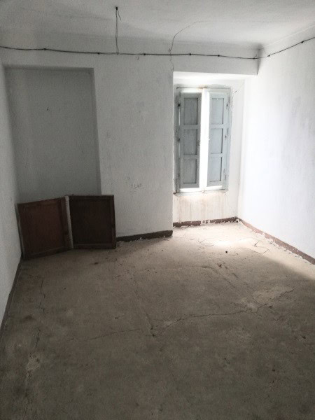 Farm property interior with window in Orce, Granada.