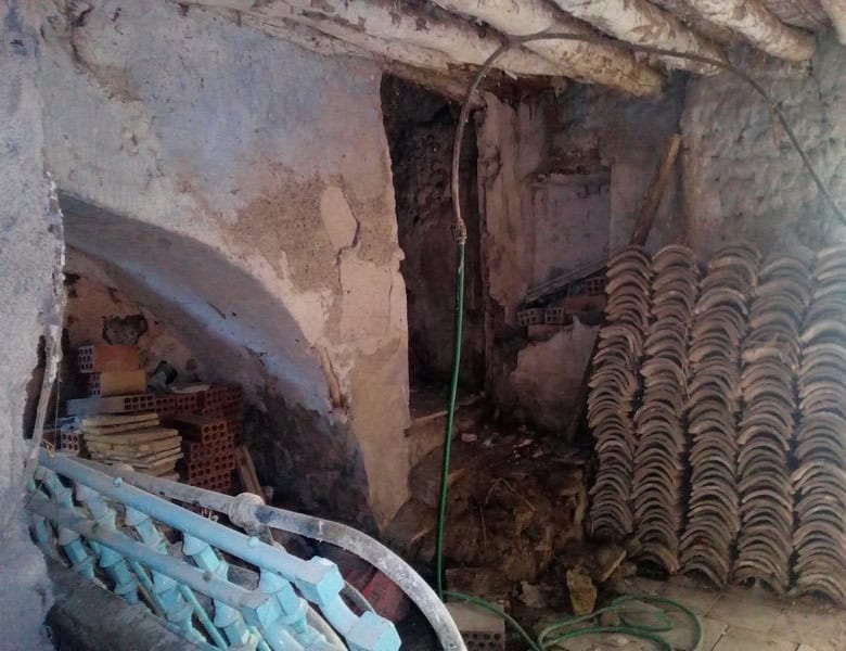 Village property in Bayarque, Almeria, featuring rustic stone walls and traditional architecture.