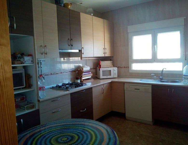 Village Property Kitchen in Hijate, Almeria with modern appliances and natural light.