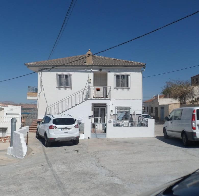 Charming two-story apartment in Freila, Granada, with parking and scenic surroundings.