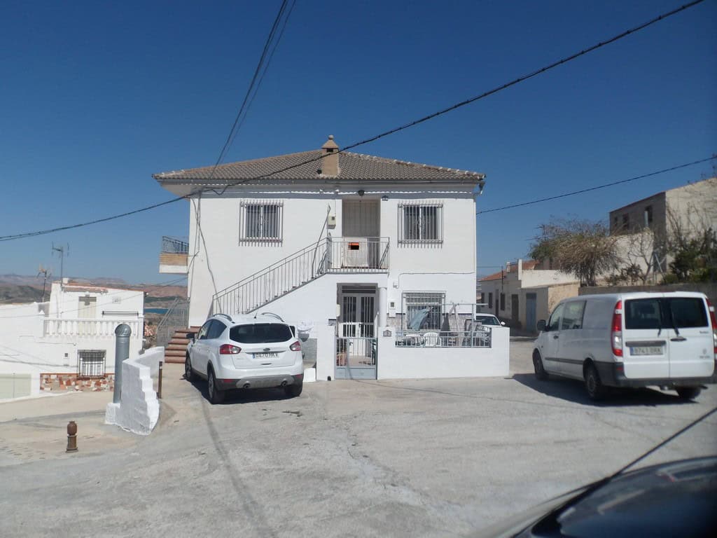 Charming two-story apartment in Freila, Granada, with parking and scenic surroundings.