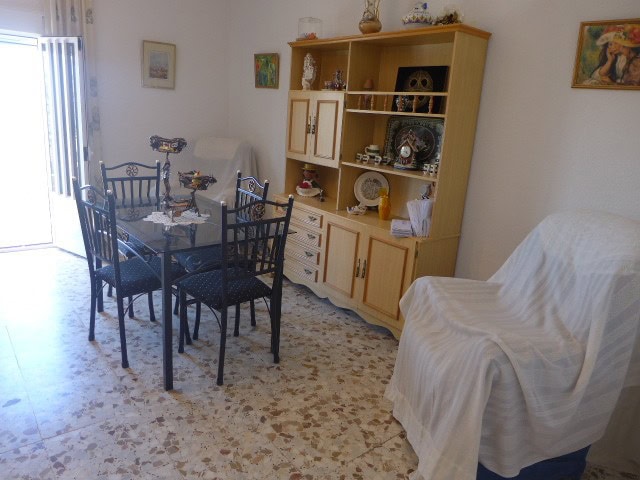 Apartment in Freila, Granada with dining area and traditional decor.