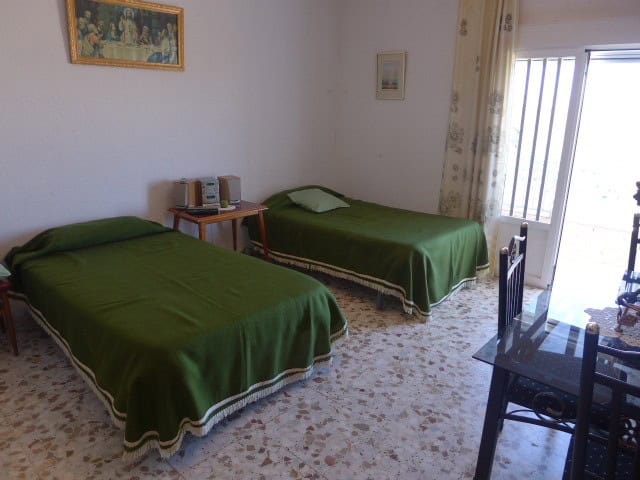 Apartment in Freila, Granada with two bedrooms and simple decor.