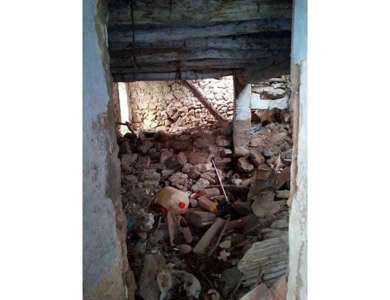 Old ruin structure in Oria, Almeria with visible debris and stone walls.