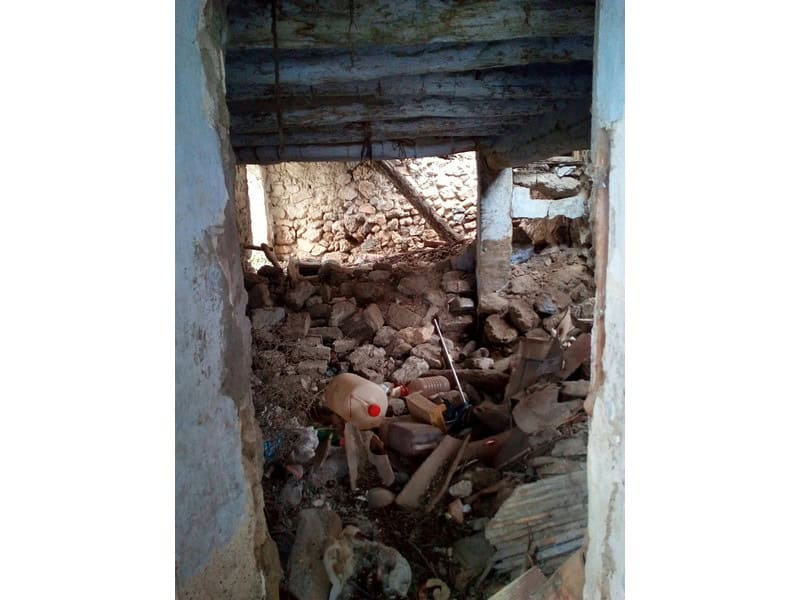 Old ruin structure in Oria, Almeria with visible debris and stone walls.