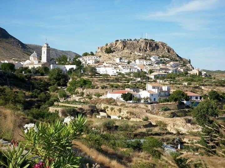Ancient ruin overlooking the village of Oria in Almeria, Spain. Scenic landscape with historic site.