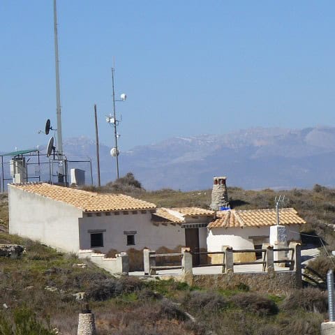 Cave house in Orce, Granada with scenic mountain views and rustic architecture.